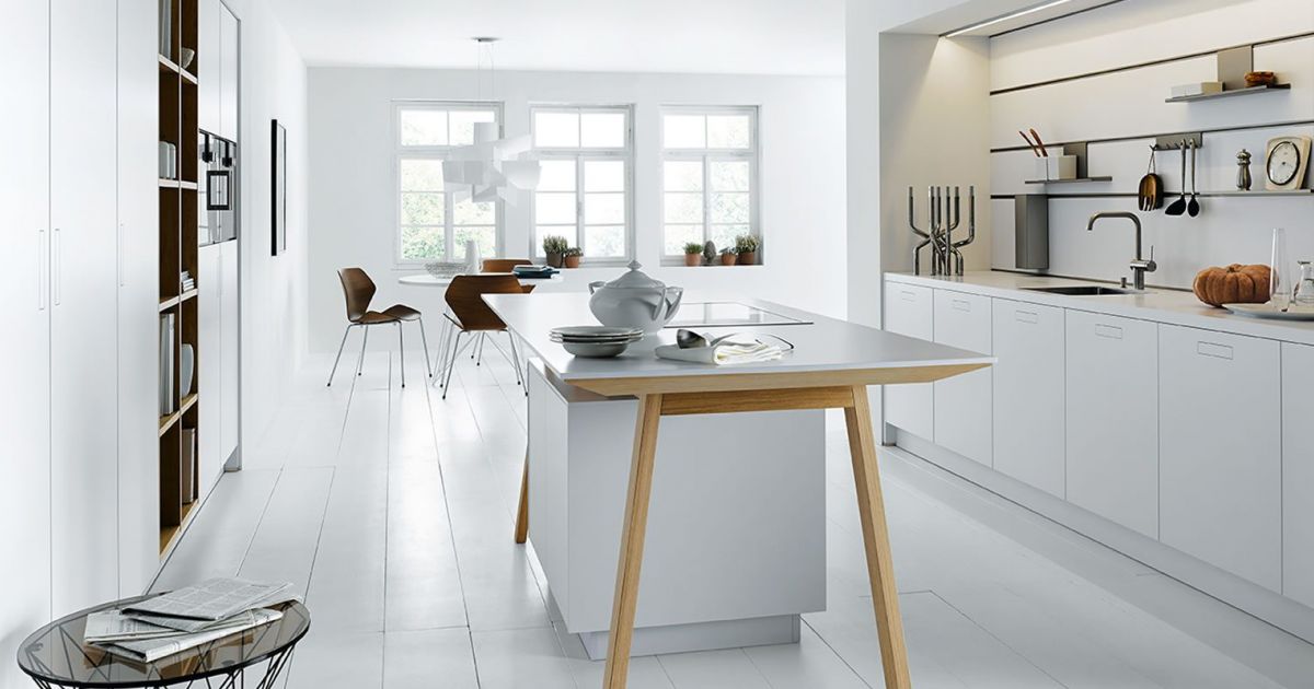 Witte kooktafel NX 800 van next125. Functioneel en uniek kookeiland. Een echte blikvanger in de keuken. Greeploze witte keuken van next125  #next125 #kooktafel #kookeiland #inductie
